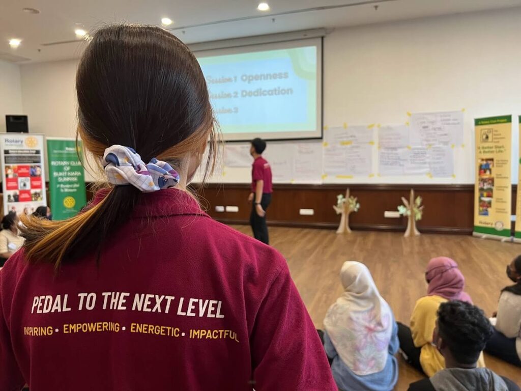 PEDALS Academy Uniform Back View - PEDAL To The Next Level